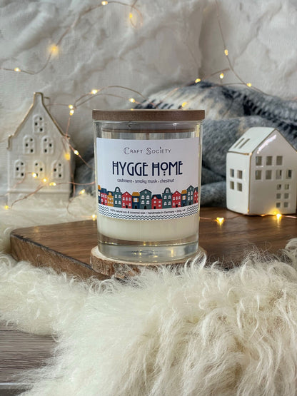 A brand new scented candle on a decorated background